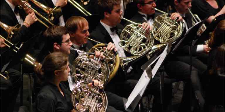 French horn section performing.